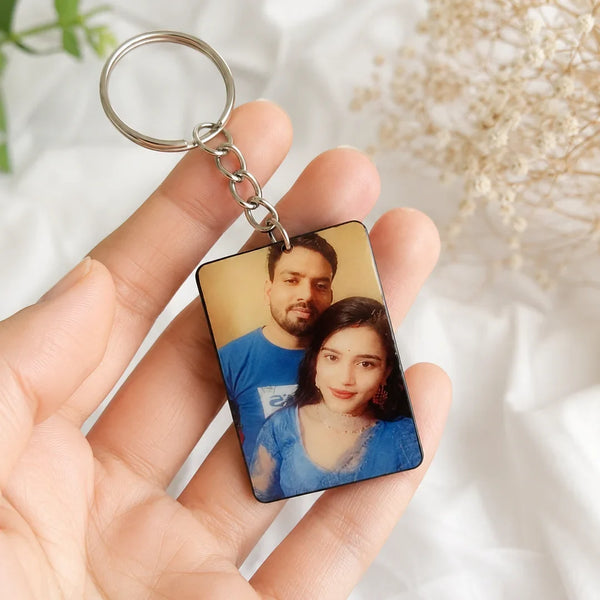 Personalized photo keychain held in hand