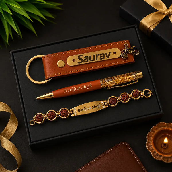 Personalized Rakhi combo with custom name keychain, engraved pen and Rudraksha bracelet in premium gift box