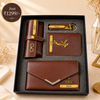 Personalized women’s leather gift hamper with custom name purse, wallet, keychain and premium gift box on beige background