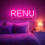 Neon sign with 'RENU' in a bedroom setting

