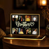 Brother photo collage acrylic LED table lamp on warm bedside background