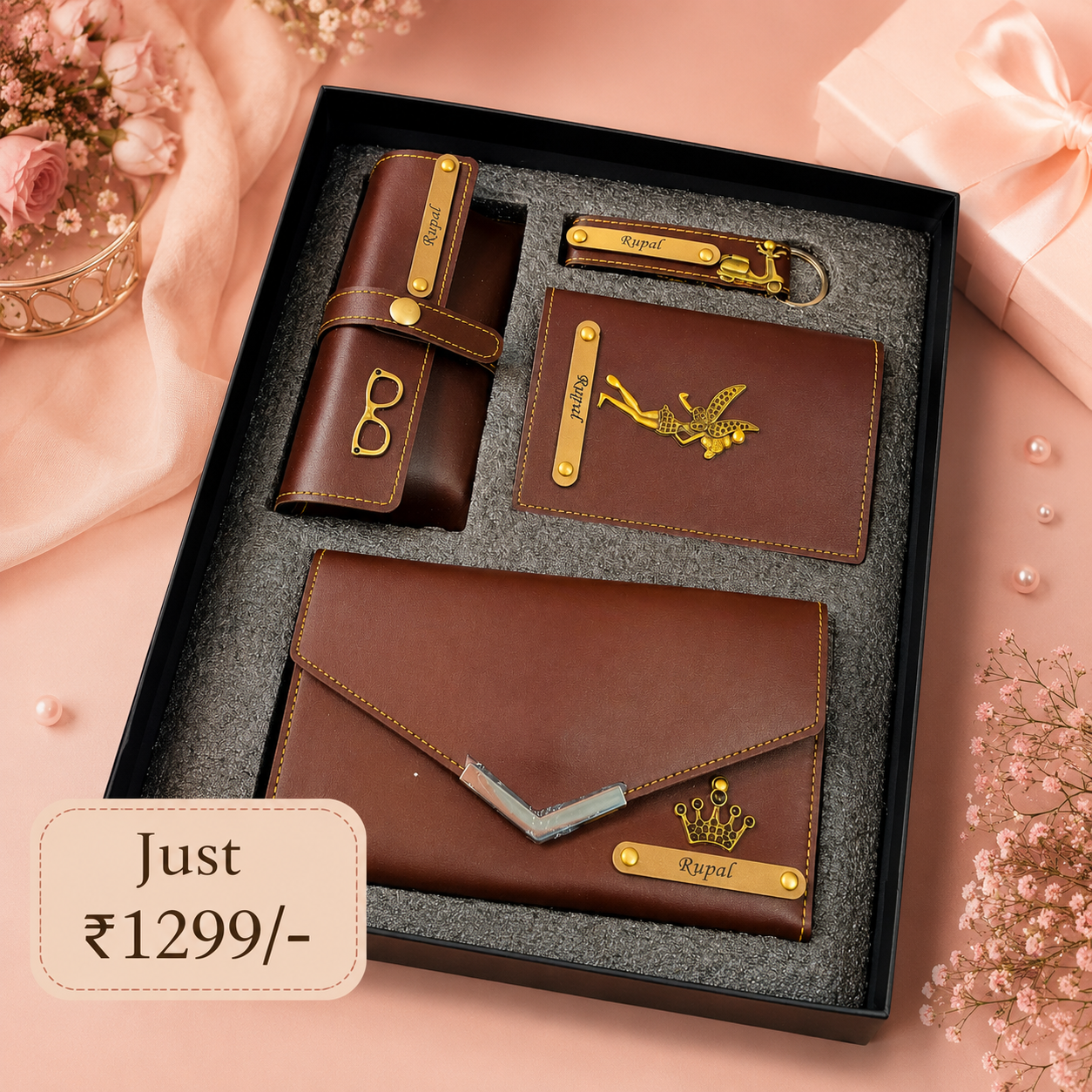 Custom name ladies leather gift hamper with purse, card holder and keychain on pink floral background