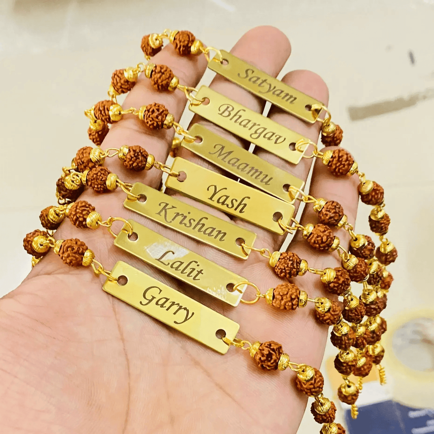Personalized Rudraksha Name Rakhi – Custom Engraved Rakhi for Brother - IG Store