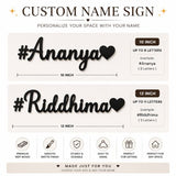 Custom name sign with '#Ananya' and '#Riddhima' on a white background

