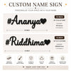 Custom name sign with '#Ananya' and '#Riddhima' on a white background