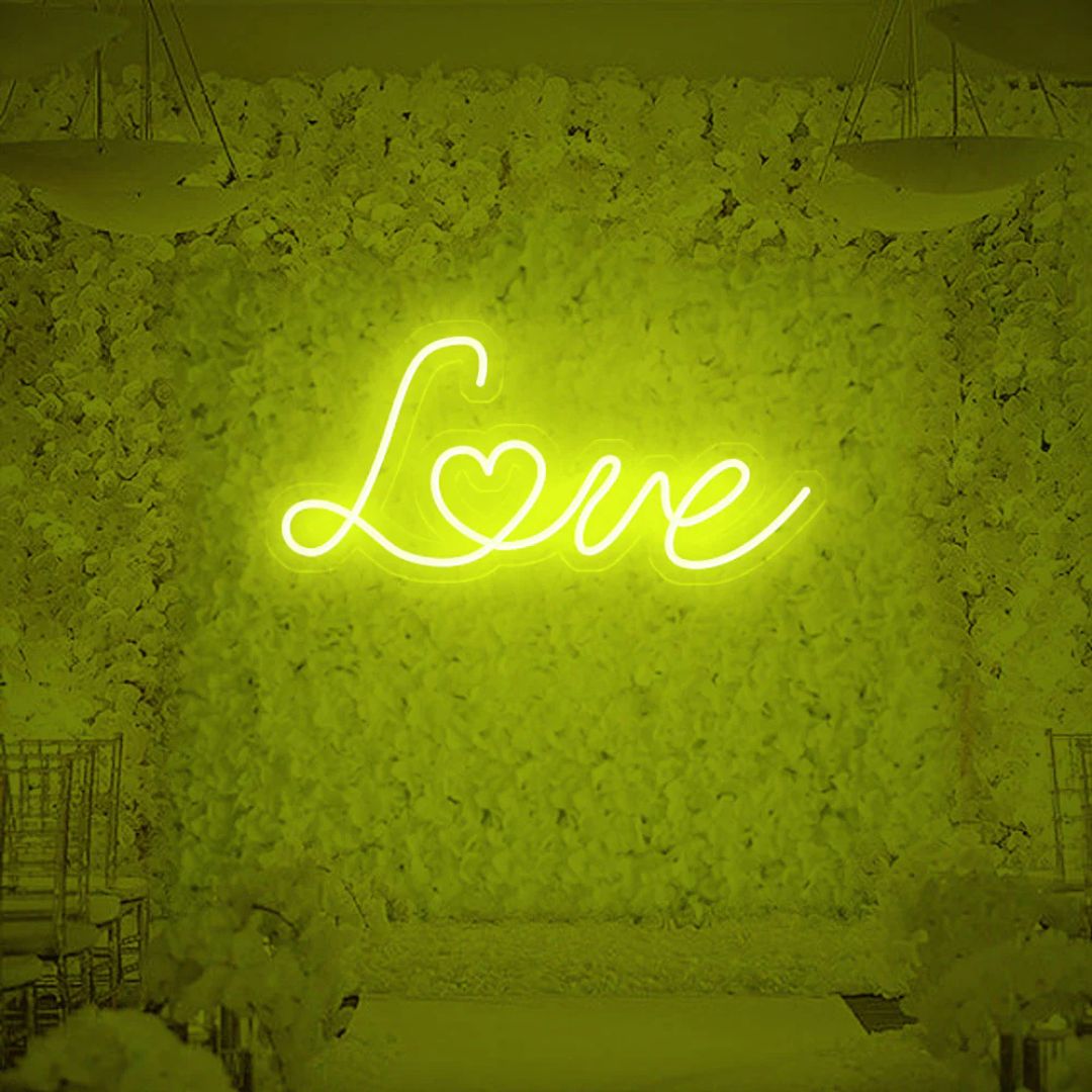 Yellow love neon sign adding warm glow to any space