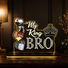 My King Bro photo LED acrylic table lamp in a premium dark study setting