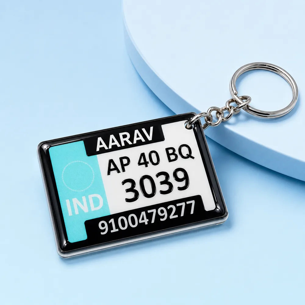 Personalized acrylic gel keychain with custom name and vehicle number plate design on blue background