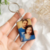 Personalized photo keychain held in hand